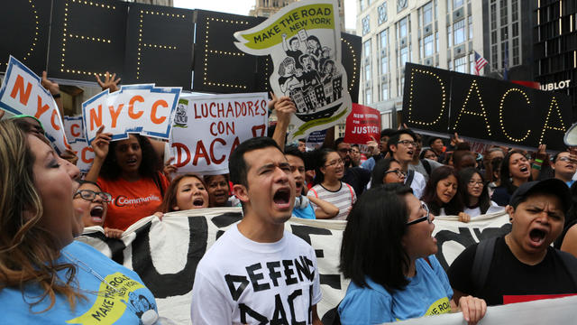 People march and chant slogans against U.S. President Donald Trump's proposed end of the DACA program that protects immigrant children from deportation at a protest in New York City 