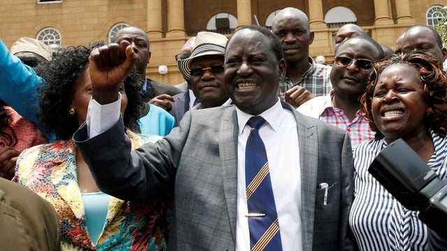 Opposition leader Raila Odinga reacts as he leaves the supreme court after President Uhuru Kenyatta's election victory was declared invalid in Nairobi 