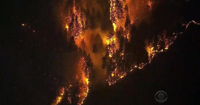 Wildfires rage in 8 Western states - CBS News