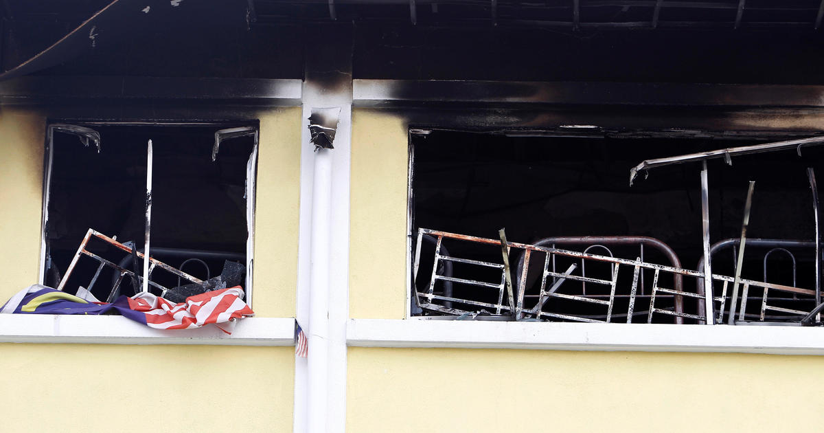 7 Suspects Arrested For Deadly Boarding School Fire In Malaysia - CBS News