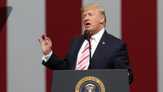 President Trump speaks to supporters during a rally for Senator Luther Strange in Huntsville 