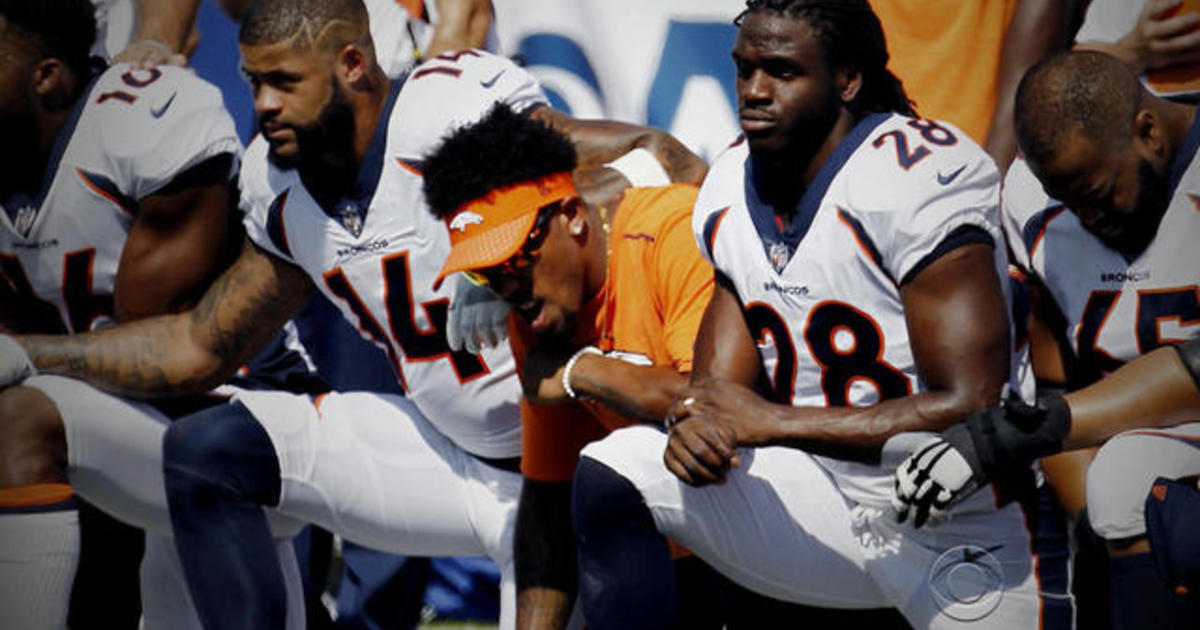 Steelers players stand for national anthem, hold banner before game vs.  Giants