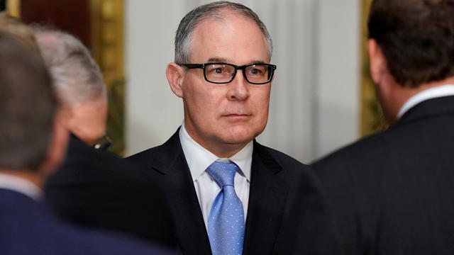 Administrator of the Environmental Protection Agency Scott Pruitt stands after the swearing-in ceremony for US Ambassador to Canada Kelly Knight Craft in Washington 