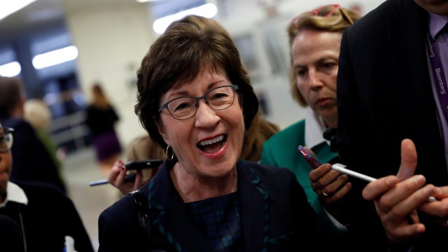 FILE PHOTO: Sen. Susan Collins speaks with reporters ahead of the party luncheons on Capitol Hill in Washington 