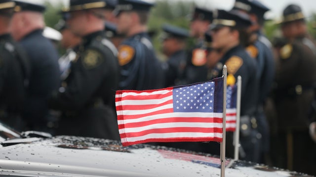 Police officers from around the country attend the funeral and a Honor Guard Ceremony for Dallas Police Officer Michael Krol in Plano 