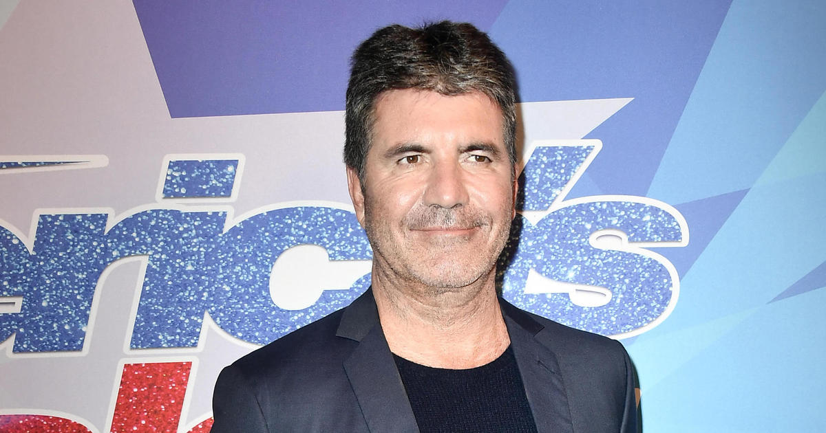 Simon Cowell home from hospital after fall CBS News