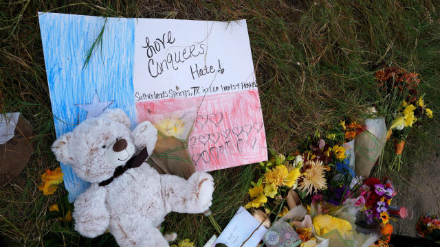 A teddy bear is left at a memorial at the site of the mass shooting at the First Baptist Church of Sutherland Springs, Texas, Nov. 7, 2017. 