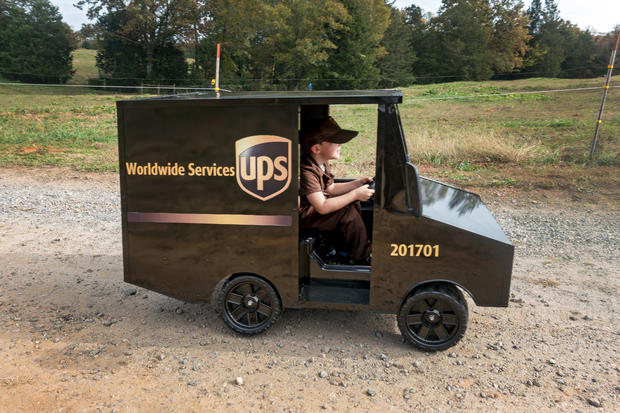 Boy Gets Mini UPS Truck 