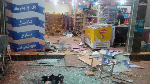A damaged storefront is seen after an earthquake in Halabja, Iraq 