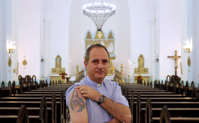 FBL-ARGENTINA-RACING-CHURCH-PRIEST 