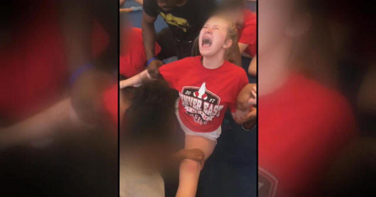 Teen cheerleader forced into split: "The world is a scary place" - CBS News