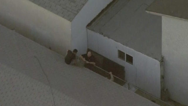 suspect-on-the-roof.jpg 