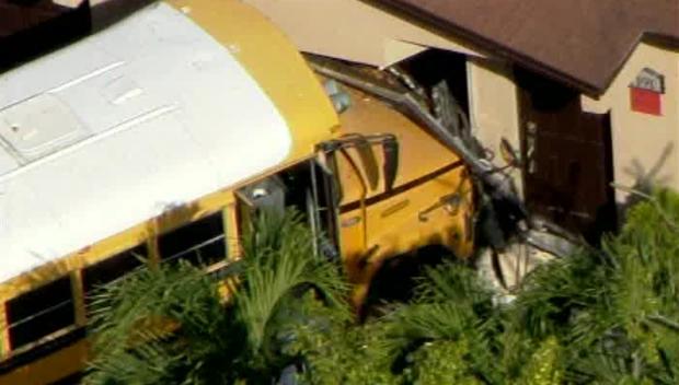 School Bus Crashes Into Home 