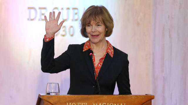FILE PHOTO: Minnesota Lt. Governor Smith waves to journalists at the end of a news conference in a Hotel in Havana 
