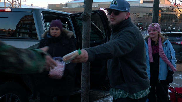Man Hands Out Sandwiches For The Homeless 