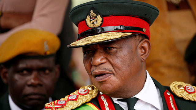 FILE PHOTO: Retired Commander of Zimbabwe Defence Forces General Constatino Chiwenga  looks on after the swearing in of Emmerson Mnangagwa as Zimbabwe's new president in Harare 