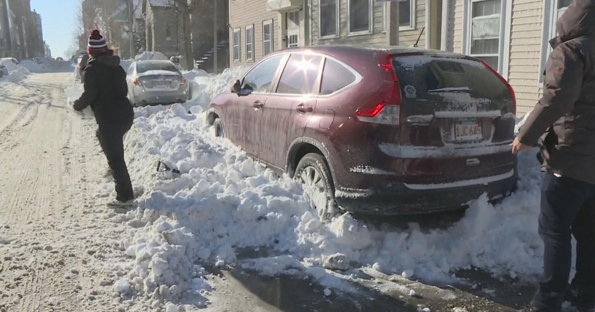 After powerful blizzard, millions dig out amid frigid temperatures and ...