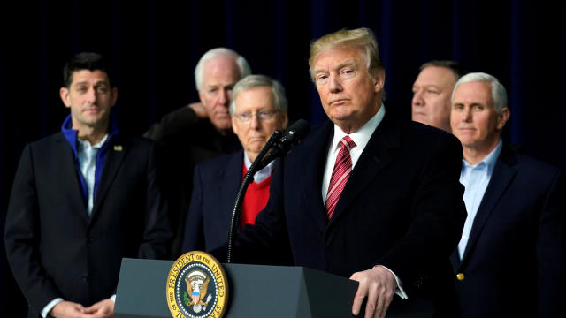 President Donald Trump speaks to the media after the Congressional Republican Leadership retreat 