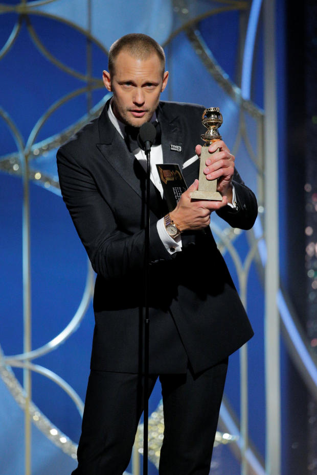 Alexander Skarsgaard holds his award for Best Performance by an Actor in a Supporting Role in a Series, Limited Series, or Motion Picture Made for Television for "Big Little Lies" at the 75th Golden Globe Awards in Beverly Hills 