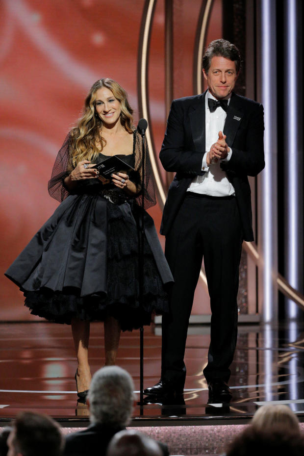 Presenters Sarah Jessica Parker and Hugh Grant at the 75th Golden Globe Awards in Beverly Hills, California, 