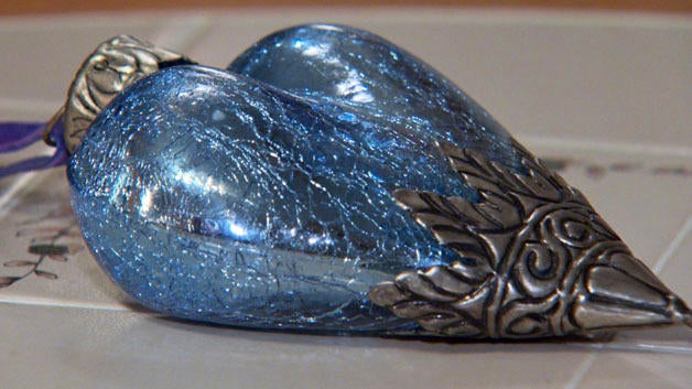 A Massachusetts woman believes she bought an urn filled with ashes at a thrift store. 