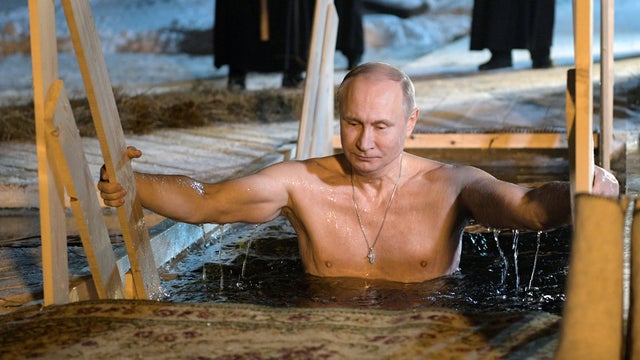 Russian President Vladimir Putin takes a dip in the water during Orthodox Epiphany celebrations at lake Seliger, Tver region 