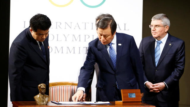 International Olympic Committee (IOC) President Thomas Bach is seen at the signing ceremony with the delegations of North and South Korea at the Olympic Museum in Lausanne 