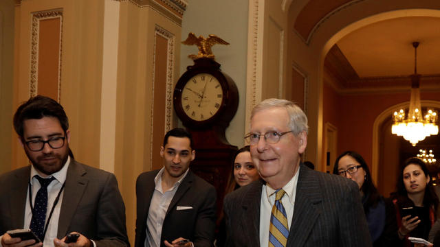 Senate Majority Leader Mitch McConnell (R-KY) walks to the Senate chamber 