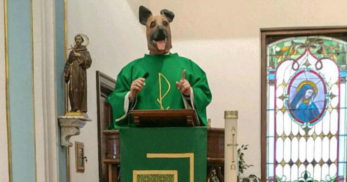 praying-for-an-eagles-win-deacon-wears-underdog-mask-during-mass-cbs