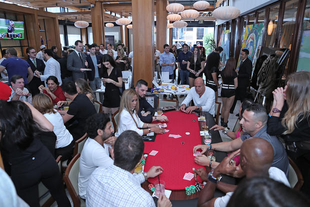 A group of A-Listers and Hall of Famers playing poker raised enough money to help nearly two dozen students in minutes. 