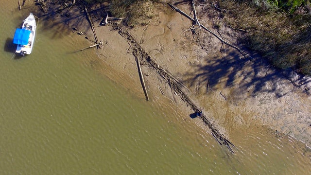 This aerial photo taken Jan. 2, 2018, in Mobile County, Ala., shows the remains of a ship that could be the Clotilda, the last slave ship documented to have delivered captive Africans to the United States. 