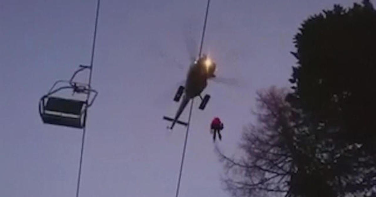 Helicopter Rescues Skiers Trapped On Broken Chairlift Cbs News