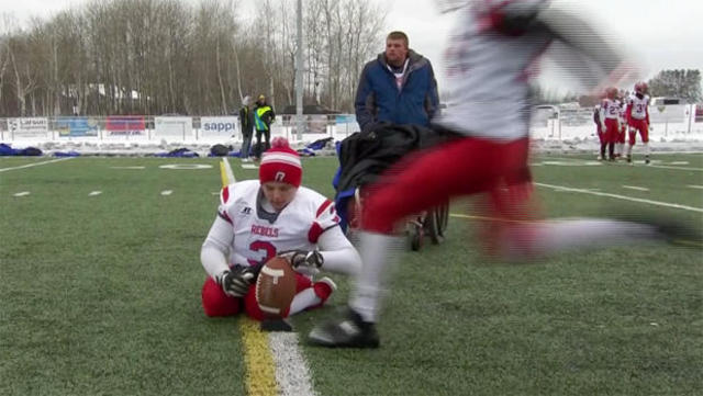 Watch Sunday Morning: Football player unrestrained by wheelchair