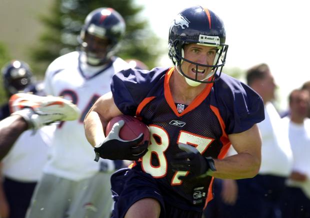 Denver Broncos WR Ed McCaffrey runs a play during practice at the Broncos mini-camp at the Dove Valley training facility. 
