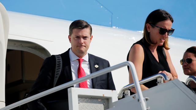 Porter and Kelly walk arrives aboard Air Force One with senior staff andTrump at Morristown Airport in Morristown, New Jersey 
