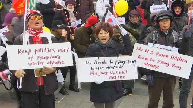 ctm-0213-south-koreans-protesting-winter-olympics.jpg 