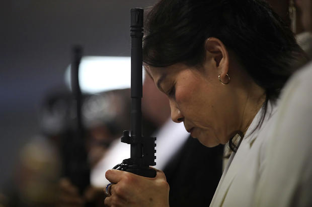 World Peace And Unification Sanctuary Religious Group Holds Blessing Ceremony For Couples And Their AR-15 Rifles 