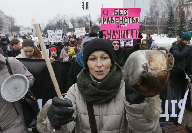 Participants attend a rally for gender equality and against violence towards women on the International Women's Day in Kiev 