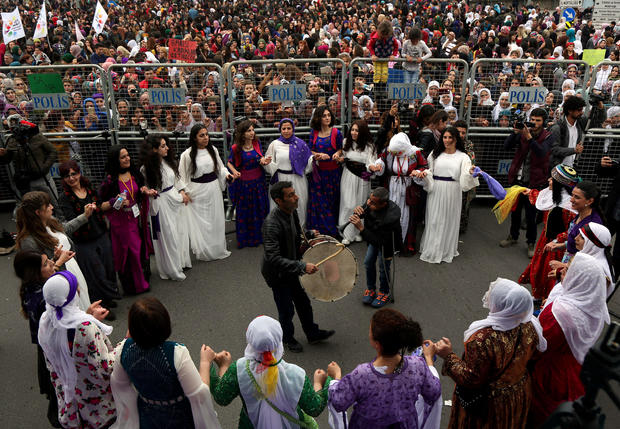 Participants dance during a rally on the International Women’s Day in Diyarbakir 