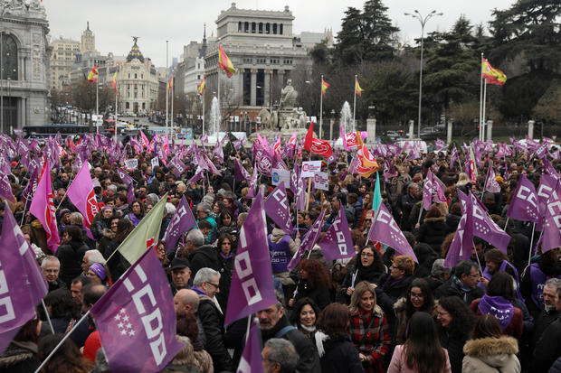 People gather during nationwide feminist strike on IWD at Cibeles Square in Madrid 