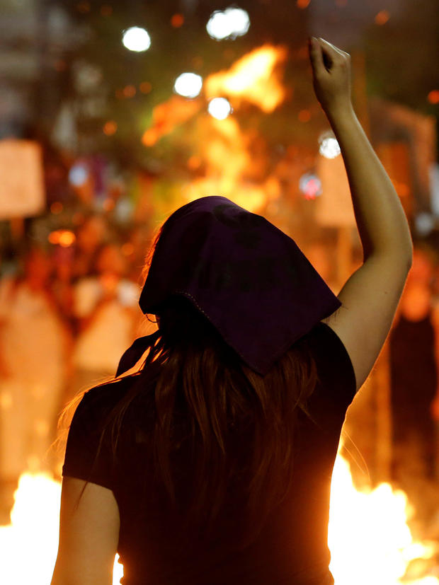 A woman participates in a demonstration as part of International Women's Day in Montevideo 