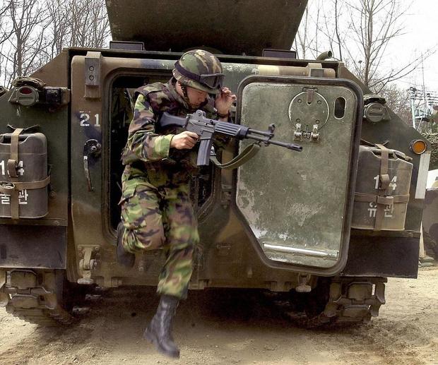 A South Korean soldier gets out of a K20 
