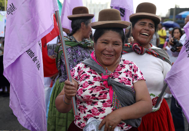 Andean women march during a demonstration as part of International Women's Day in Lima 