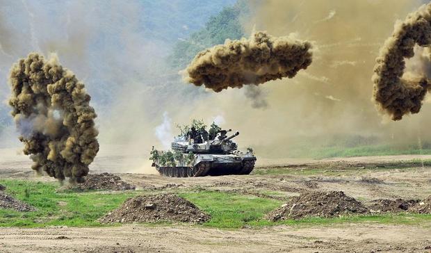 A South Korea's K1 tank fires smoke shel 