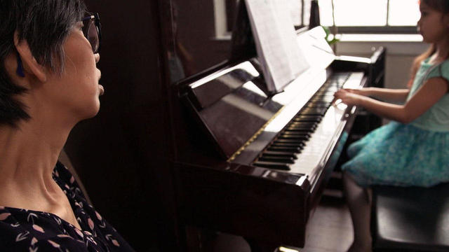 julia-yip-williams-with-daughter-playing-piano-promo.jpg 