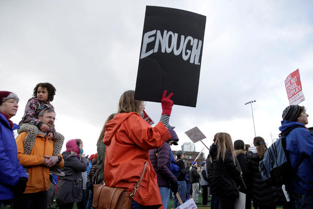 Parople gather during a "March For Our Lives" demonstration demanding gun control in Seattle 