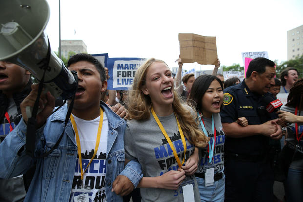 Student organizers lead the "March for Our Lives", an organized demonstration to end gun violence, in downtown Houston 