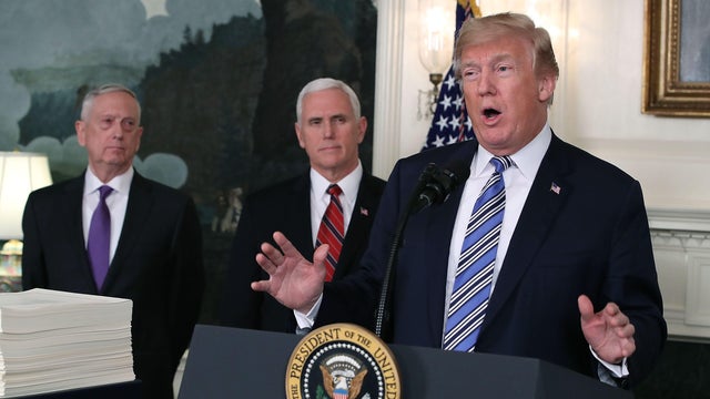 President Trump Makes Statement And Signs Spending Bill 