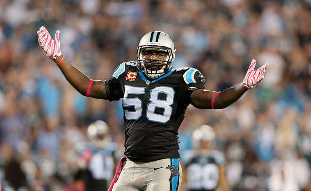 Carolina Panthers linebacker Thomas Davis lifts the NFC