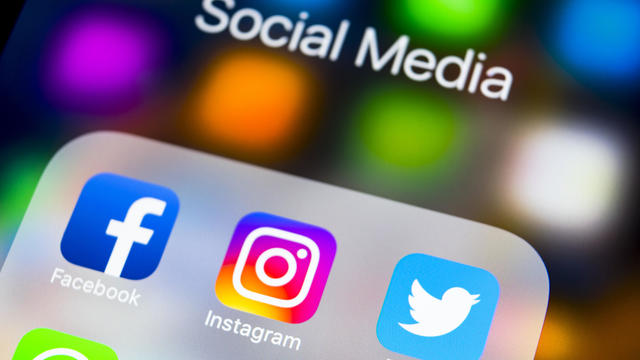 Facebook, Instagram, Twitter logo - social media on Apple iPhone X 